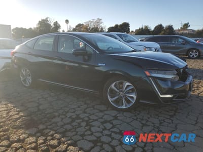 Czwarte zdjęcie samochodu z boku: 2019 HONDA CLARITY TOURING VIN:JHMZC5F3XKC002271 - miniatura
