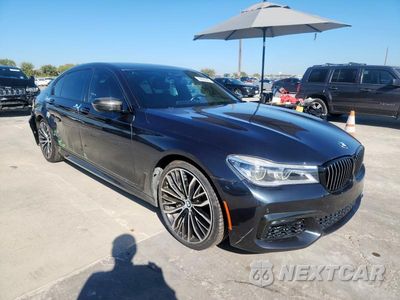 Czwarte zdjęcie samochodu z boku: 2019 BMW 750 I VIN:WBA7F0C57KGM25243 - miniatura