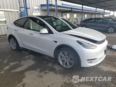 Czwarte zdjęcie samochodu z boku: 2023 TESLA MODEL Y VIN:7SAYGAEE2PF742875 - miniatura