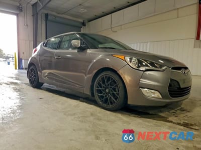 Czwarte zdjęcie samochodu z boku: 2013 HYUNDAI VELOSTER VIN:KMHTC6AD0DU093198 - miniatura