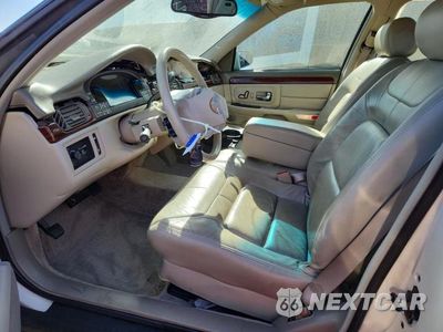 Zdjęcie 7 z 13 samochodu: 1999 CADILLAC DEVILLE VIN:1G6KD54YXXU762347 - miniatura