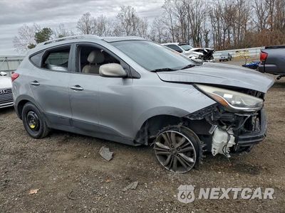 Czwarte zdjęcie samochodu z boku: 2015 HYUNDAI TUCSON LIMITED VIN:KM8JUCAG0FU102076 - miniatura