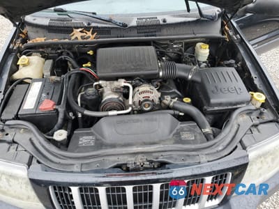 Zdjęcie 12 z 13 samochodu: 2004 JEEP GRAND CHEROKEE LAREDO VIN:1J4GW48N74C332200 - miniatura