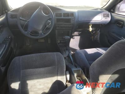 Zdjęcie 8 z 12 samochodu: 1994 TOYOTA COROLLA DX VIN:JT2AE09B8R0070667 - miniatura