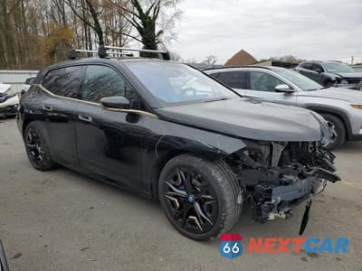 Czwarte zdjęcie samochodu z boku: 2023 BMW IX M60 VIN:WB533CF04PCM51160 - miniatura