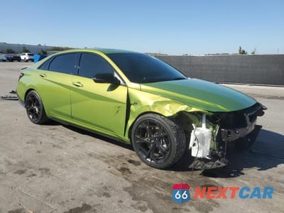 Czwarte zdjęcie samochodu z boku: 2024 HYUNDAI ELANTRA N LINE VIN:KMHLR4DF4RU745750 - miniatura