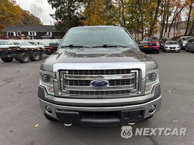 Piąte zdjęcie samochodu w środku: 2014 FORD F150 SUPERCREW VIN:1FTFW1ET1EFC80954 - miniatura