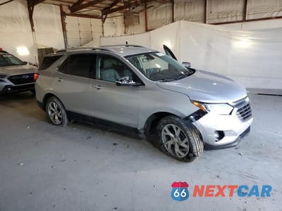 Czwarte zdjęcie samochodu z boku: 2019 CHEVROLET EQUINOX PREMIER VIN:2GNAXXEV7K6144949 - miniatura