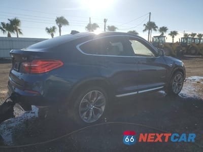 Trzecie zdjęcie samochodu z tyłu: 2015 BMW X4 XDRIVE35I VIN:5UXXW5C51F0E87821 - miniatura