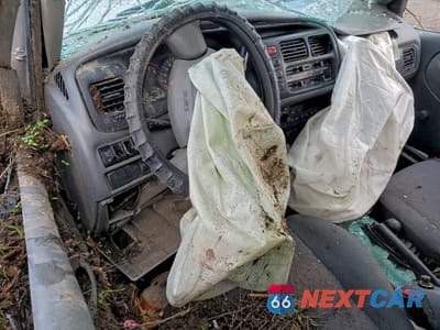 Zdjęcie 8 z 11 samochodu: 2000 CHEVROLET TRACKER VIN:2CNBJ13C6Y6910753 - miniatura