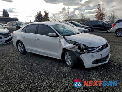 Czwarte zdjęcie samochodu z boku: 2014 VOLKSWAGEN JETTA TDI VIN:3VWLL7AJ4EM225544 - miniatura