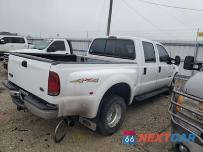 Trzecie zdjęcie samochodu z tyłu: 2000 FORD F350 SUPER DUTY VIN:1FTWW33F3YED41899 - miniatura