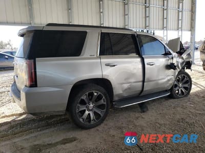Trzecie zdjęcie samochodu z tyłu: 2017 GMC YUKON SLT VIN:1GKS2BKC6HR279388 - miniatura