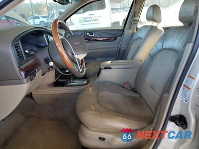Zdjęcie 7 z 14 samochodu: 2002 LINCOLN CONTINENTAL VIN:1LNHM97V12Y690290 - miniatura