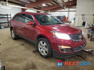 Czwarte zdjęcie samochodu z boku: 2014 CHEVROLET TRAVERSE LTZ VIN:1GNKRJKD5EJ333193 - miniatura