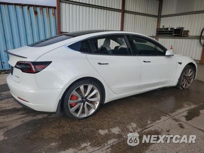 Trzecie zdjęcie samochodu z tyłu: 2019 TESLA MODEL 3 VIN:5YJ3E1EB8KF440289 - miniatura