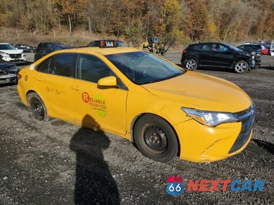Czwarte zdjęcie samochodu z boku: 2015 TOYOTA CAMRY HYBRID VIN:4T1BD1FK6FU168279 - miniatura