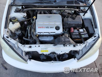 Zdjęcie 11 z 14 samochodu: 2004 TOYOTA CAMRY LE VIN:4T1BF32K44U073065 - miniatura