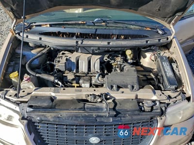 Zdjęcie 12 z 14 samochodu: 1999 CHRYSLER TOWN & COUNTRY LX VIN:1C4GT54LXXB567726 - miniatura