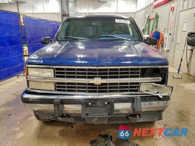 Piąte zdjęcie samochodu w środku: 1993 CHEVROLET SUBURBAN K1500 VIN:1GNFK16K3PJ344968 - miniatura
