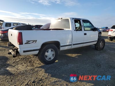 Trzecie zdjęcie samochodu z tyłu: 1997 GMC SIERRA K1500 VIN:1GTEK19R1VE523397 - miniatura