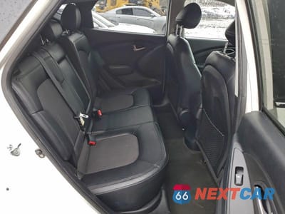 Zdjęcie 11 z 13 samochodu: 2010 HYUNDAI TUCSON GLS VIN:KM8JUCAC6AU080462 - miniatura
