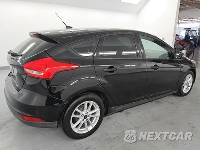 Trzecie zdjęcie samochodu z tyłu: 2017 FORD FOCUS SE VIN:1FADP3K21HL278287 - miniatura