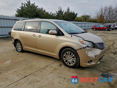 Czwarte zdjęcie samochodu z boku: 2014 TOYOTA SIENNA XLE VIN:5TDYK3DC0ES434300 - miniatura