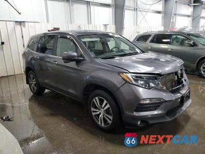 Czwarte zdjęcie samochodu z boku: 2018 HONDA PILOT EXL VIN:5FNYF6H56JB028344 - miniatura