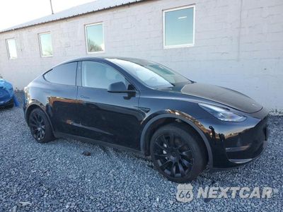 Czwarte zdjęcie samochodu z boku: 2023 TESLA MODEL Y VIN:7SAYGDEE2PA181379 - miniatura