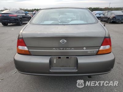 Zdjęcie 6 z 12 samochodu: 1999 NISSAN ALTIMA XE VIN:1N4DL01D0XC143734 - miniatura