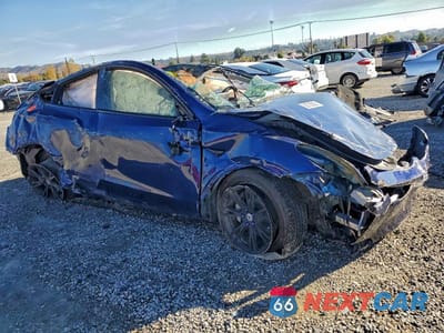 Czwarte zdjęcie samochodu z boku: 2022 TESLA MODEL Y VIN:7SAYGAEE5NF467290 - miniatura