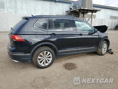 Trzecie zdjęcie samochodu z tyłu: 2018 VOLKSWAGEN TIGUAN SE VIN:3VV2B7AX7JM109062 - miniatura