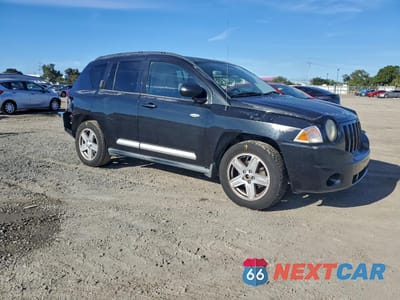 Czwarte zdjęcie samochodu z boku: 2010 JEEP COMPASS SPORT VIN:1J4NF1FB7AD675044 - miniatura