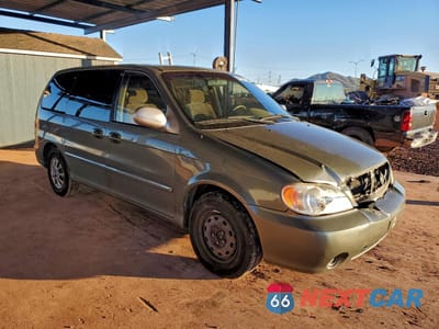 Czwarte zdjęcie samochodu z boku: 2004 KIA SEDONA EX VIN:KNDUP131646597732 - miniatura