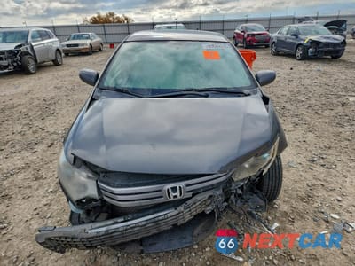 Piąte zdjęcie samochodu w środku: 2010 HONDA INSIGHT LX VIN:JHMZE2H56AS007558 - miniatura