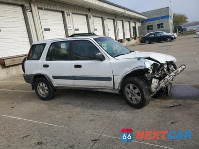 Czwarte zdjęcie samochodu z boku: 1999 HONDA CR-V LX VIN:JHLRD184XXC062381 - miniatura
