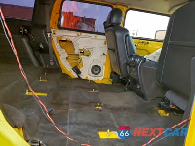 Zdjęcie 11 z 14 samochodu: 2005 HUMMER H2 VIN:5GRGN23U75H132545 - miniatura
