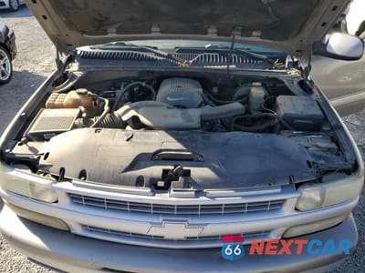 Zdjęcie 12 z 13 samochodu: 2002 CHEVROLET SUBURBAN C1500 VIN:1GNEC16T42J216099 - miniatura