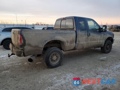 Trzecie zdjęcie samochodu z tyłu: 2002 FORD F250 SUPER DUTY VIN:1FTNX21F32EB73906 - miniatura