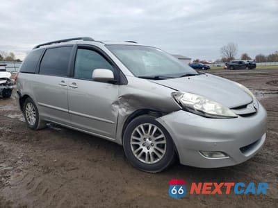 Czwarte zdjęcie samochodu z boku: 2010 TOYOTA SIENNA XLE VIN:5TDYK4CC3AS316002 - miniatura