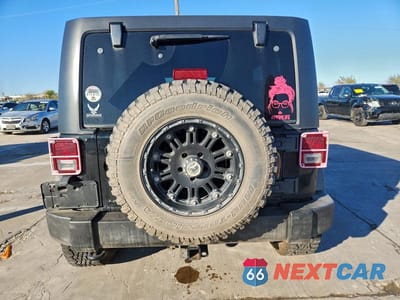 Zdjęcie 6 z 12 samochodu: 2011 JEEP WRANGLER UNLIMITED RUBICON VIN:1J4BA6H13BL580118 - miniatura
