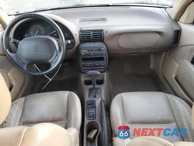 Zdjęcie 8 z 12 samochodu: 1995 SATURN SL2 VIN:1G8ZK5275SZ120135 - miniatura