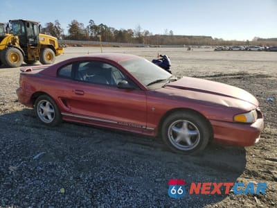 Czwarte zdjęcie samochodu z boku: 1998 FORD MUSTANG VIN:1FAFP4041WF155362 - miniatura