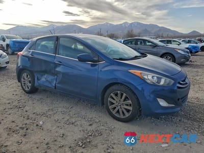 Czwarte zdjęcie samochodu z boku: 2014 HYUNDAI ELANTRA GT BASE VIN:KMHD35LH0EU166280 - miniatura