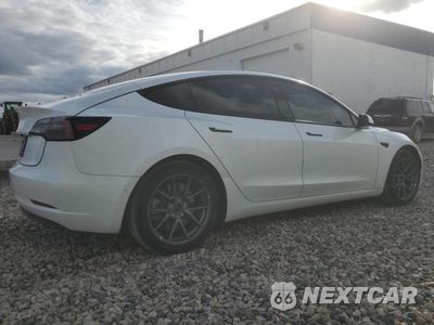 Trzecie zdjęcie samochodu z tyłu: 2021 TESLA MODEL 3 VIN:5YJ3E1EA6MF939473 - miniatura