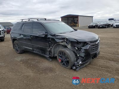 Czwarte zdjęcie samochodu z boku: 2018 CHEVROLET TRAVERSE PREMIER VIN:1GNEVJKW3JJ274763 - miniatura