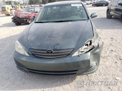 Piąte zdjęcie samochodu w środku: 2002 TOYOTA CAMRY LE VIN:4T1BF32K52U506468 - miniatura