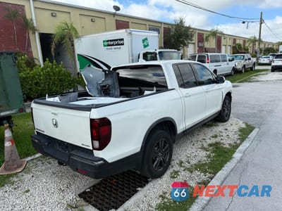 Czwarte zdjęcie samochodu z boku: 2019 HONDA RIDGELINE SPORT VIN:5FPYK2F12KB001221 - miniatura