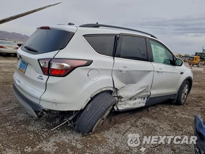 Trzecie zdjęcie samochodu z tyłu: 2017 FORD ESCAPE SE VIN:1FMCU9GD2HUA54883 - miniatura